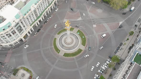 Flying over column of freedom in the center of Tbilisi. St. George monument