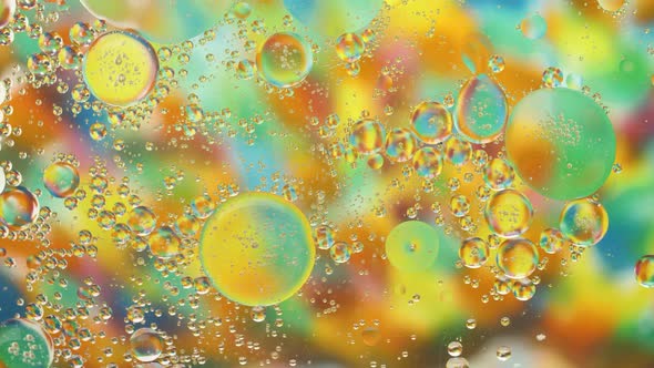 Crystalline Bubbles Flowing on Hued Colorful Background