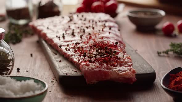 Woman Chef Cooking Ribs Closeup