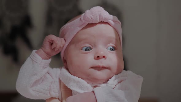 Funny Newborn Baby Girl with Pink Headband