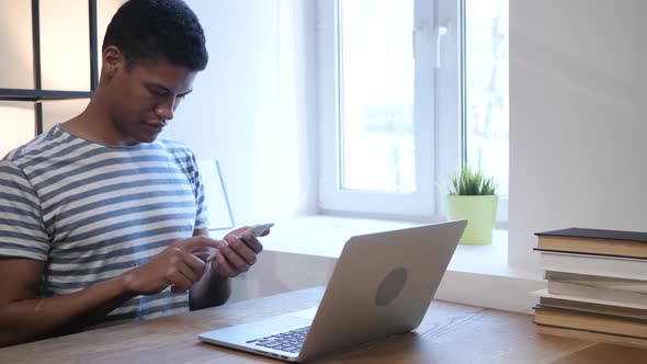 Black Man Using Smartphone, Text Messaging