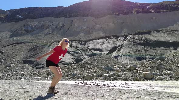 Girl Jumping in Morteratsch Glacier