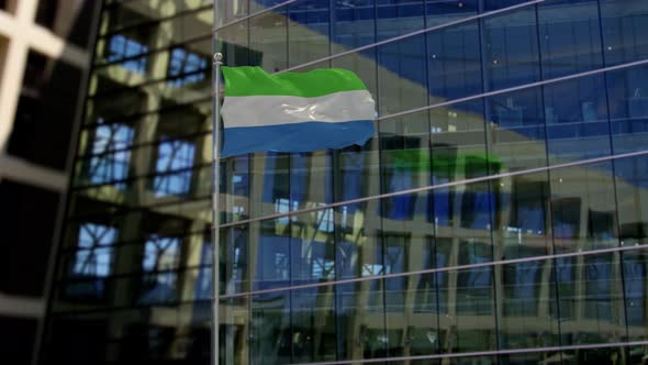 Sierra Leone Flag Waving On A Skyscraper Building