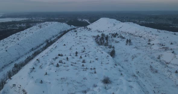 Snow-capped Mountains And Forests In Winter