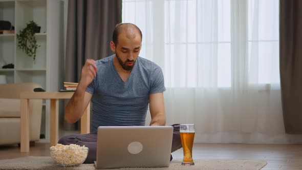 Zoom in Shot of Angry Man on a Video Call