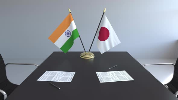 Flags of India and Japan on the Table alt