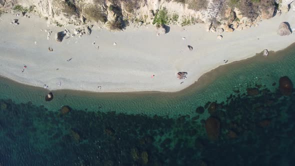 Aerial View on Calm Azure Sea and Volcanic Rocky Shores