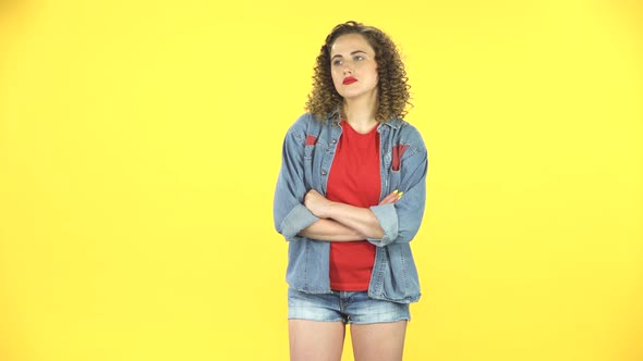 Woman Being Shocked with Unexpected News Screaming in Anxiety Isolated on Yellow Background 