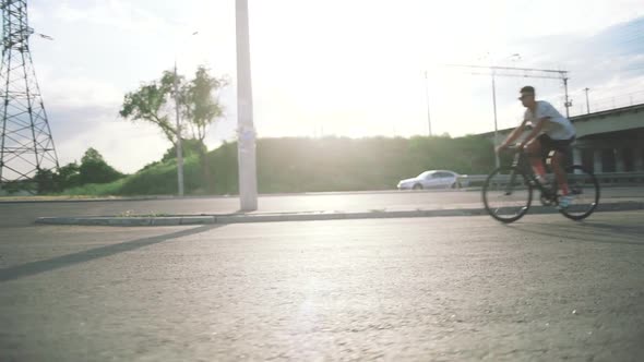 Group of Cyclists Riding Fixed Gear Bikes on the Road Steadycome Shot Slow Motion