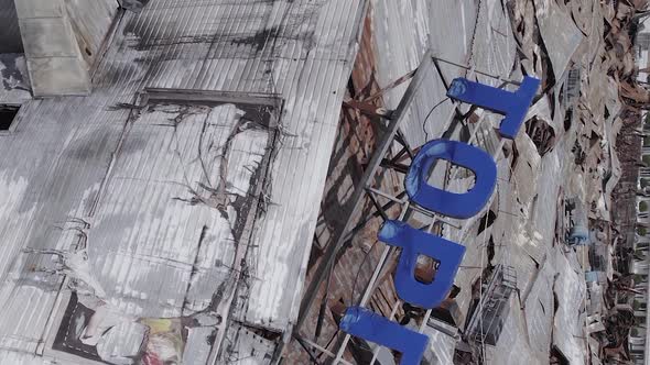 Vertical Video Ukraine in War  Destroyed Shopping Center in Bucha