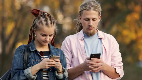 Phone Addicts in Street