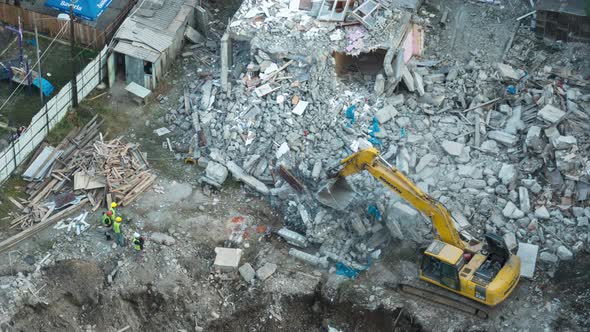 Time Lapse of Destroying Old House Using Bucket Excavator on Construction Site