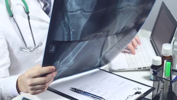 Doctor Radiologist Working In A Modern Hospital