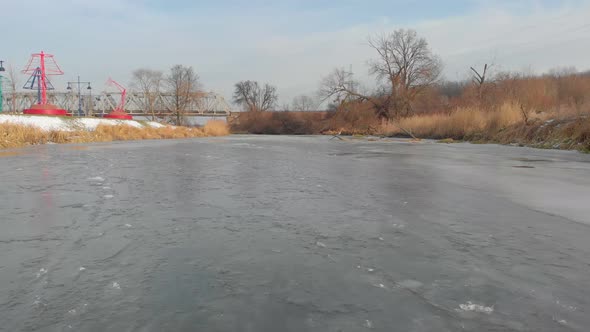 Flying Over A Frozen River