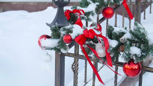 Christmas Decor on the Railing. Entrance To a House or Cafe