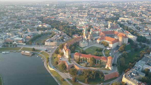 Aerial View of Royal Wawel Cathedral and Castle in Krakow, Poland, with Vistula River, Park, Yard