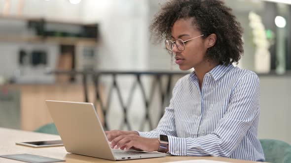 Strict African Businesswomen with Laptop Saying No By Finger Sign