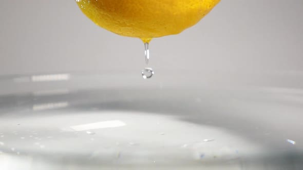 Drop of Water Drip From Lemon