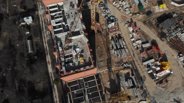 Drone Flying Over a Construction Site with a Top Down View. The Camera Flies Superstructure, Top