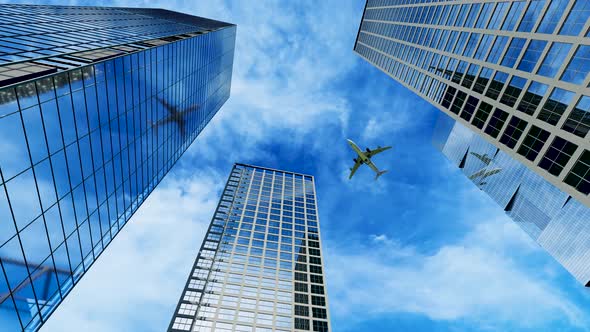 The Plane Flies Over The Buildings