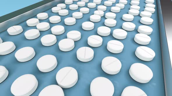 White pills on the conveyor line of pharmaceutical factory moving for packaging 4k alt