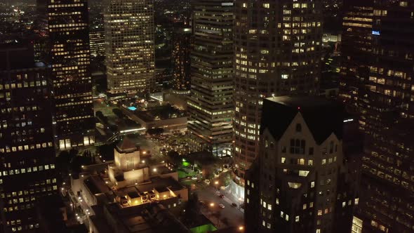 In Between Skyscraper Canyon of a Big City Los Angeles California at Night with Lit Up Illuminated