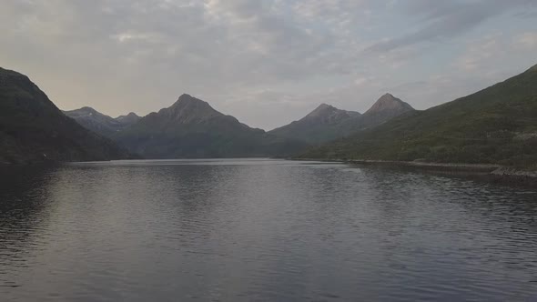 Midnight Sun in Napp/Flakdstad, Lofoten Islands, Norway Aerial Drone 4K