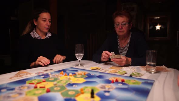 Women Playing Board Game