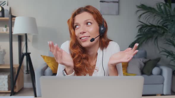 Young Caucasian Woman Talking Enthusiastically Using Headset and Smiling