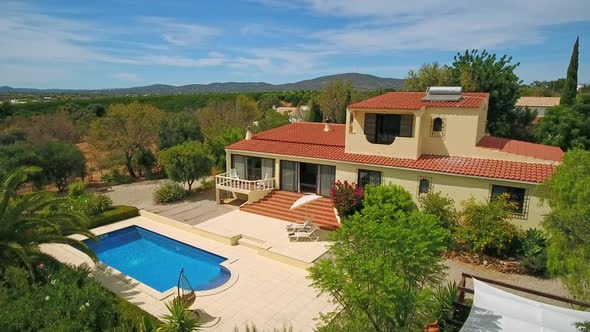 Aerial Video of Private Luxury Villa a Delightful Pool and Some Nice Green Vegetation