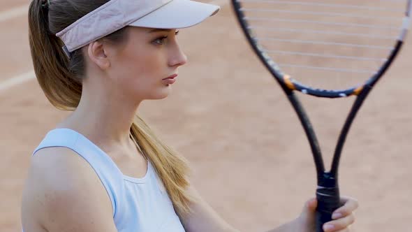 Athletic Tennis Woman Preparing for Match, Looking at Opponent Seriously, Sport