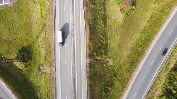 Aerial View of a Suburban Junction with Slowly Moving Cars