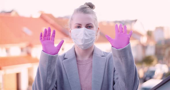 Woman Wearing Protective Mask and Gloves