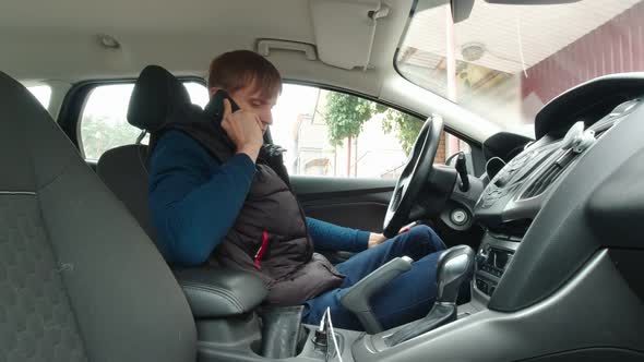 Man With The Phone Straightens Hair