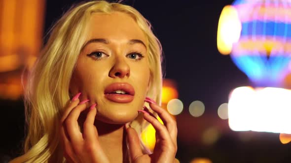 Portrait of Sexy Blonde Woman on Las Vegas Strip at Night Slow Motion