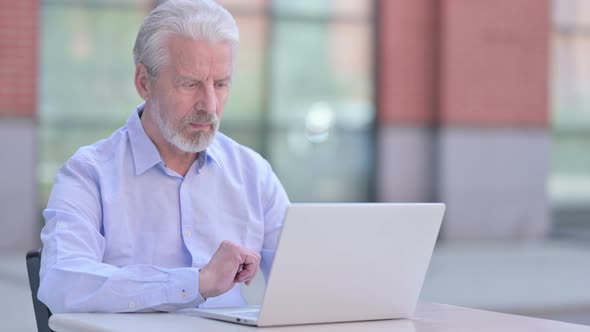 Outdoor Old Man Working on Laptop