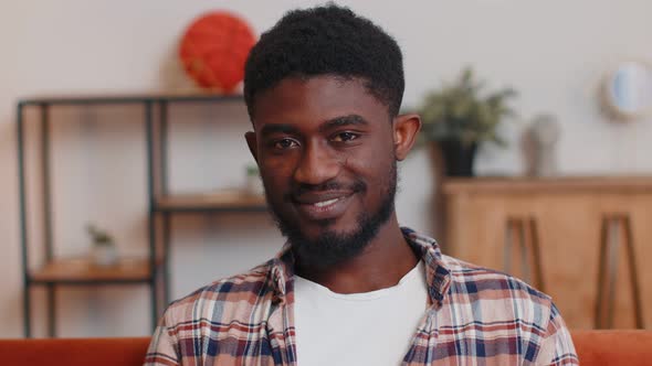 Lovely Playful Happy Man African American Smiling Blinking Eye Looking at Camera with Toothy Smile