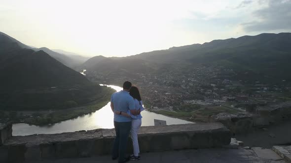 Aerial view of couple standing near Jvary monastery in Mtskheta, Georgia