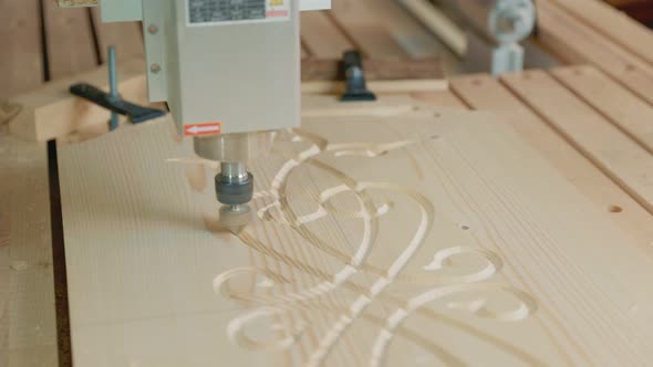 CNC Machine Cuts a Pattern on a Workpiece