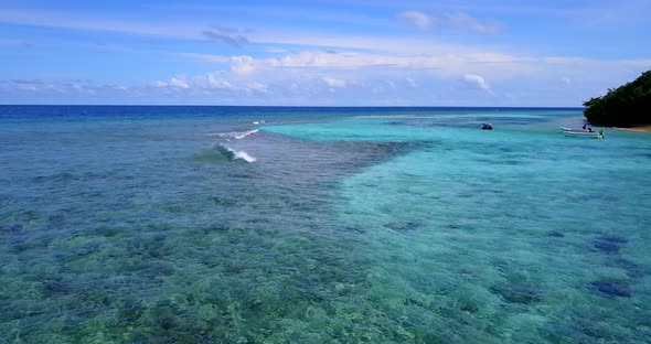 Tropical drone clean view of a white paradise beach and aqua turquoise water background in colourful