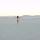 Girl walking away in the desert - VideoHive Item for Sale