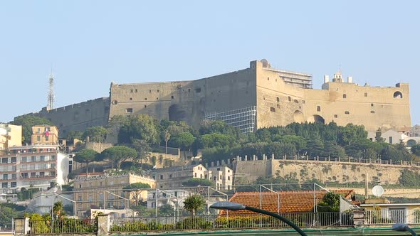 Gorgeous view on Castel Sant Elmo and embankment in Naples, tourism, sequence