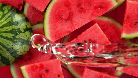 Super Slow Motion Shot of Splashing Water on Fresh Watermelon Slices at 1000Fps