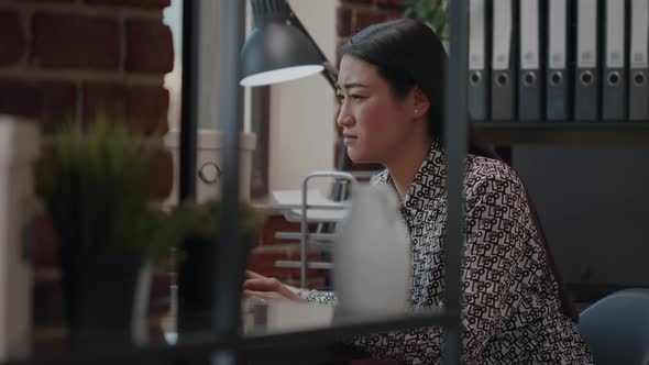 Close Up of Woman Feeling Stressed About Work Deadline