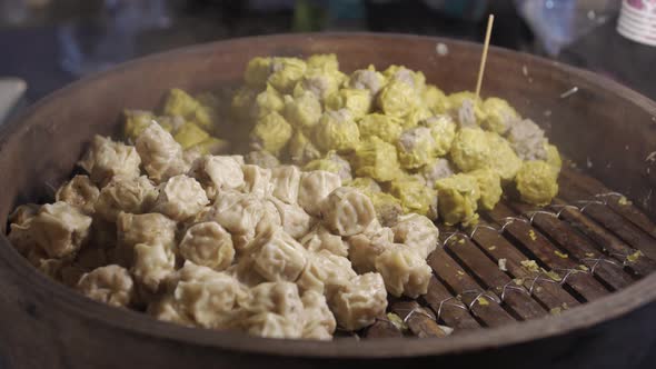 Hot and Fresh Traditional Asian Dim Sums in a Basket