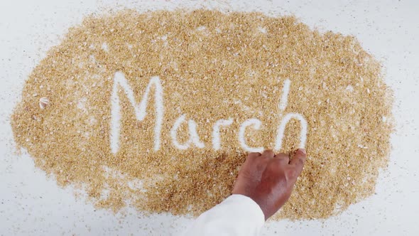 Hand Writes On Sand   March 