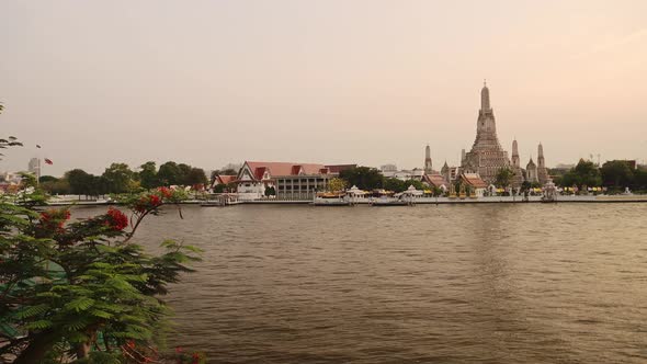 Thailand Bangkok Sunset River City Scene Cityscape Skyline, Buddhist Temple of Wat Arun and Chao Phr