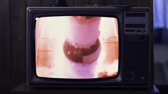 Launch of Apollo 11 on Vintage Television at Night.