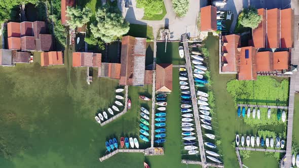 Aerial of boat houses at and jetties at lake Ammer, Bavaria, Germany