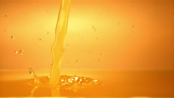 Super Slow Motion Orange Juice Pours